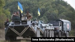 Украинские военные на полигоне в Житомирской области, где им проводят обучение британские инструкторы , 11 августа 2015 года