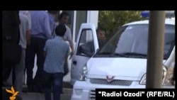 Tajikistan -- Asadullo Ibrohimov entering Sino district court, 21 October 2013