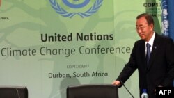 South Africa -- UN Secretary-General Ban Ki Moon sarrives for a press conference during the COP 17 conference in Durban, 06Dec2011