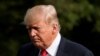 U.S. -- U.S. President Donald Trump walks on the South Lawn of the White House upon his return from Bedminster, New Jersey, to Washington, U.S., August 19, 2018