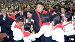 North Korea -- Leader Kim Jong-Un (C) at a concert to celebrate the 66th anniversary of the Korean Children's Union (KCU) organizations in Pyongyang, 06Jun2012