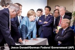 Ангела Меркель на саммите G7 9 июня 2018