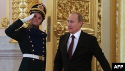 Russia -- President Vladimir Putin enters a hall in the Grand Kremlin palace in Moscow, 24Jan2013