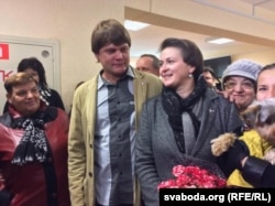 Tatsyana Karatkevich and her husband at a polling station in Minsk on October 11, 2015