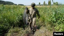 Усталяваньне загароды на літоўска-беларускай мяжы. Ліпень 2021