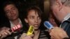 answers journalists' questions in front of the court in Aix-en-Provence, 27May2009